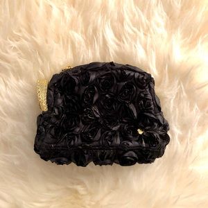 Stephanie Johnson rosette black pouch
